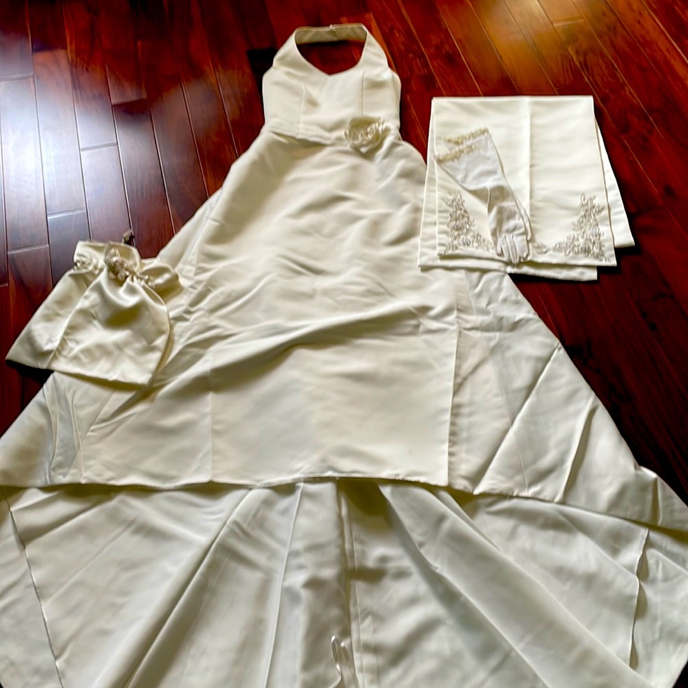 Perfect condition. With back button detail includes gloves and sash bag